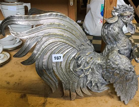 Large silvered metal model of a strutting cockerel